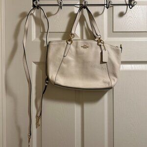 cream color coach bag